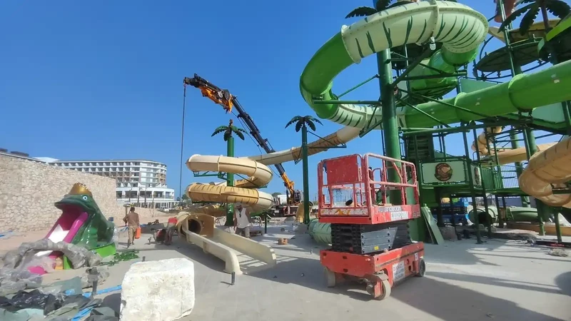 Construction site photograph showing water park structures, attractions or related systems — 1 of 15