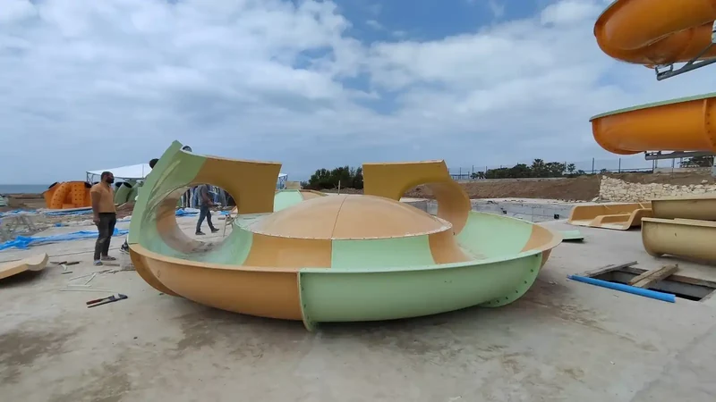 Construction site photograph showing water park structures, attractions or related systems — 2 of 15